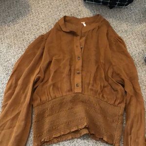 Free people long sleeve rust colored blouse